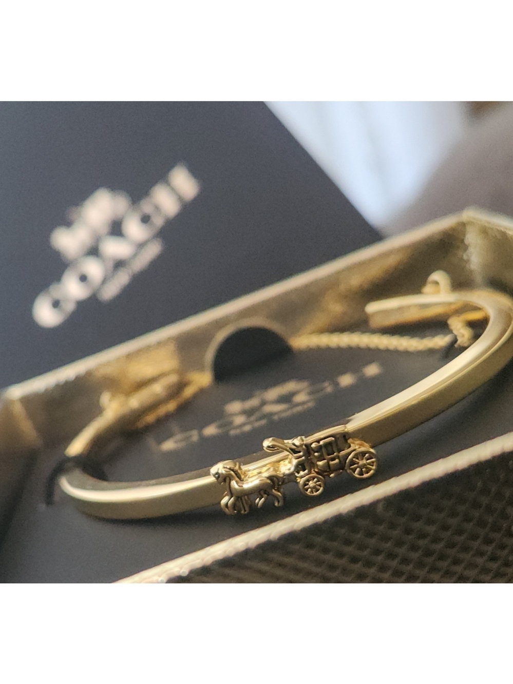 Coach Gold Tone Horse & Carriage Bangle Bracelet